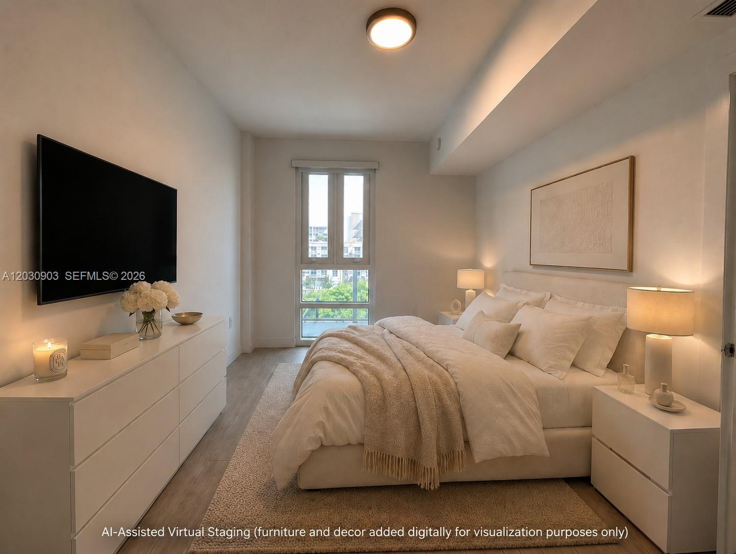 This bedroom features a bed, dresser, wall-mounted television, and a window with an exterior view — 321 NE 26th St # 601, Miami FL 33137, MIAMI, FL