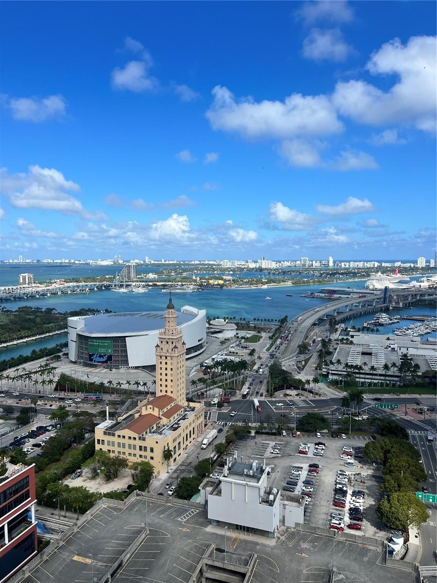 An aerial view of the Freedom Tower, Kaseya Center, and the Port of Miami — 121 NE 5th st # 3400, Miami FL 33132, MIAMI, FL