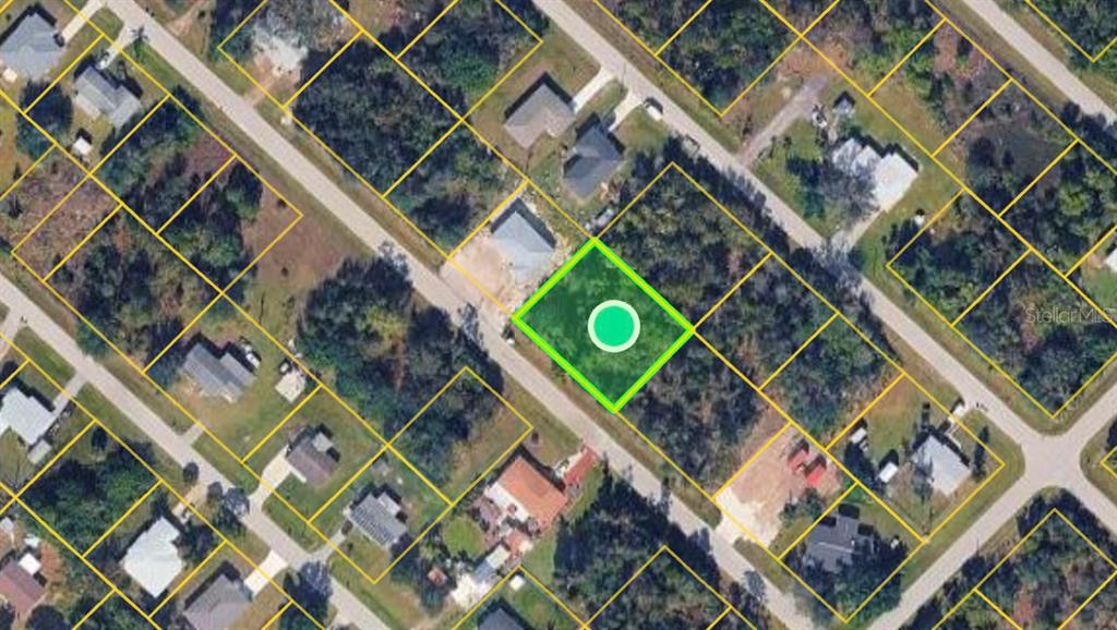 This aerial map shows a highlighted vacant residential lot situated along a paved road — 11294 4TH AVENUE, PUNTA GORDA, FL