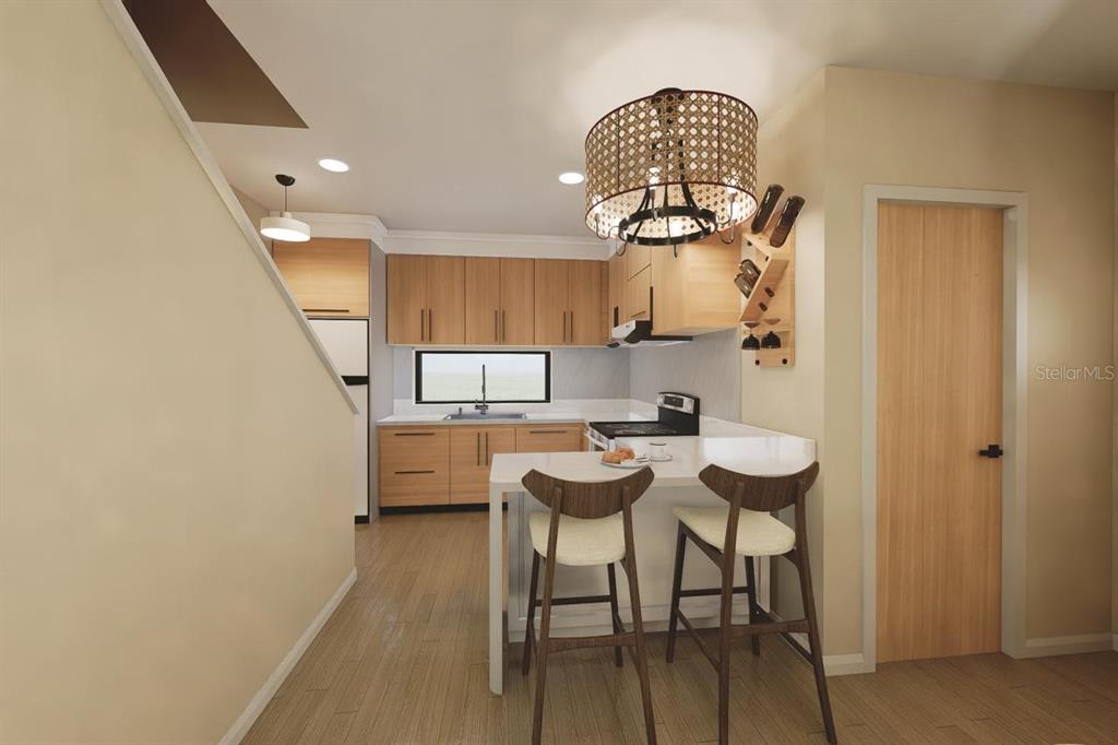 This is a rendering of a modern kitchen featuring light wood cabinets and a breakfast bar — 10775 RODEO DRIVE UNIT 1, LAKEWOOD RANCH, FL