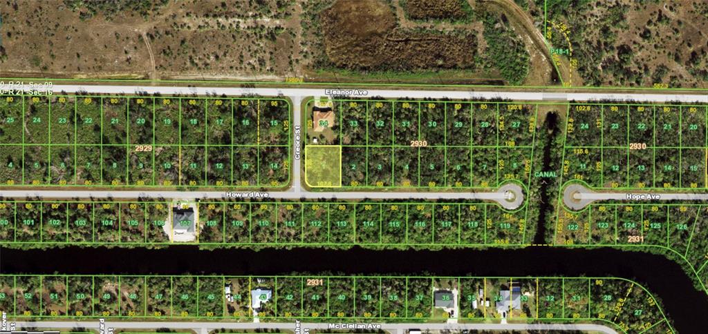 This is a satellite map view of a residential area with subdivided lots and streets — 14394 HOWARD AVENUE, PORT CHARLOTTE, FL