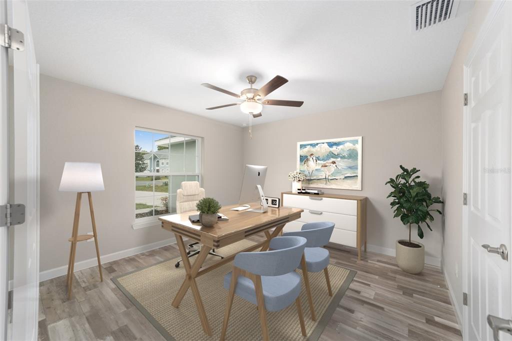 This is a digital rendering of a home office featuring a desk, chairs, and flooring — 4190 SW 98TH STREET, OCALA, FL