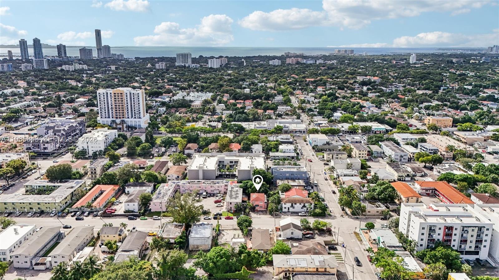 An aerial view shows a residential neighborhood with a highlighted house and surrounding buildings — 984 SW 6th St, Miami FL 33130, MIAMI, FL