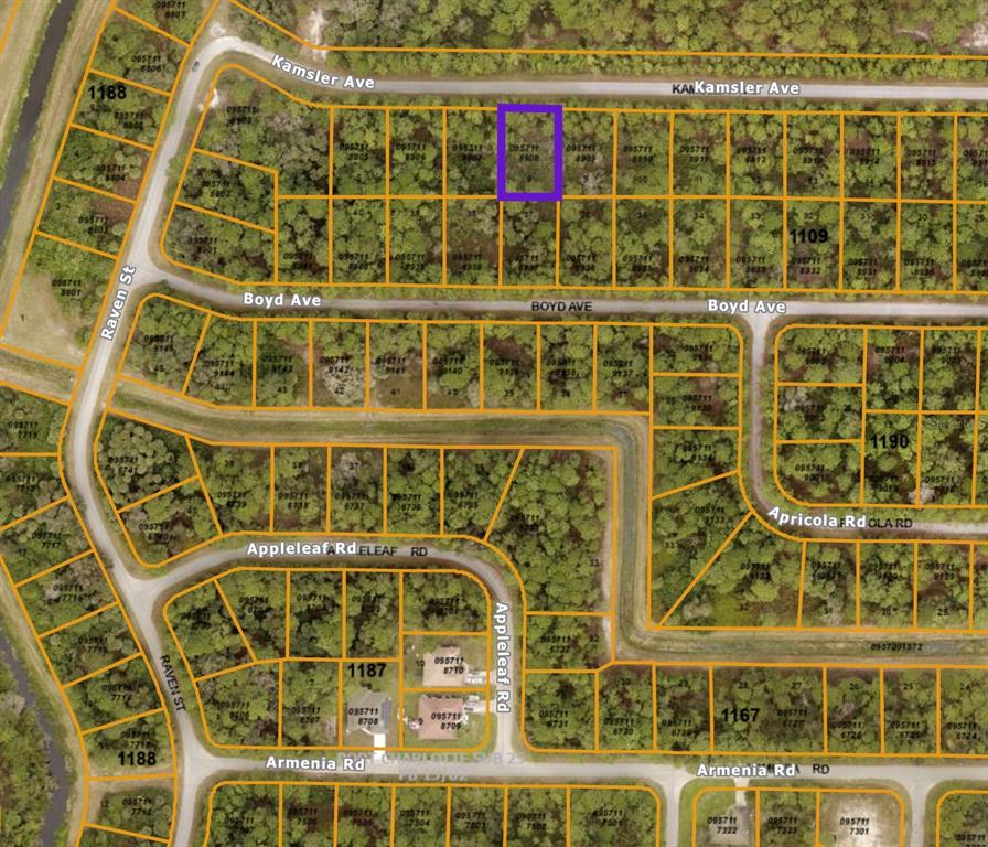 This is a map showing a residential subdivision with a highlighted vacant lot — KAMSLER AVE, NORTH PORT, FL