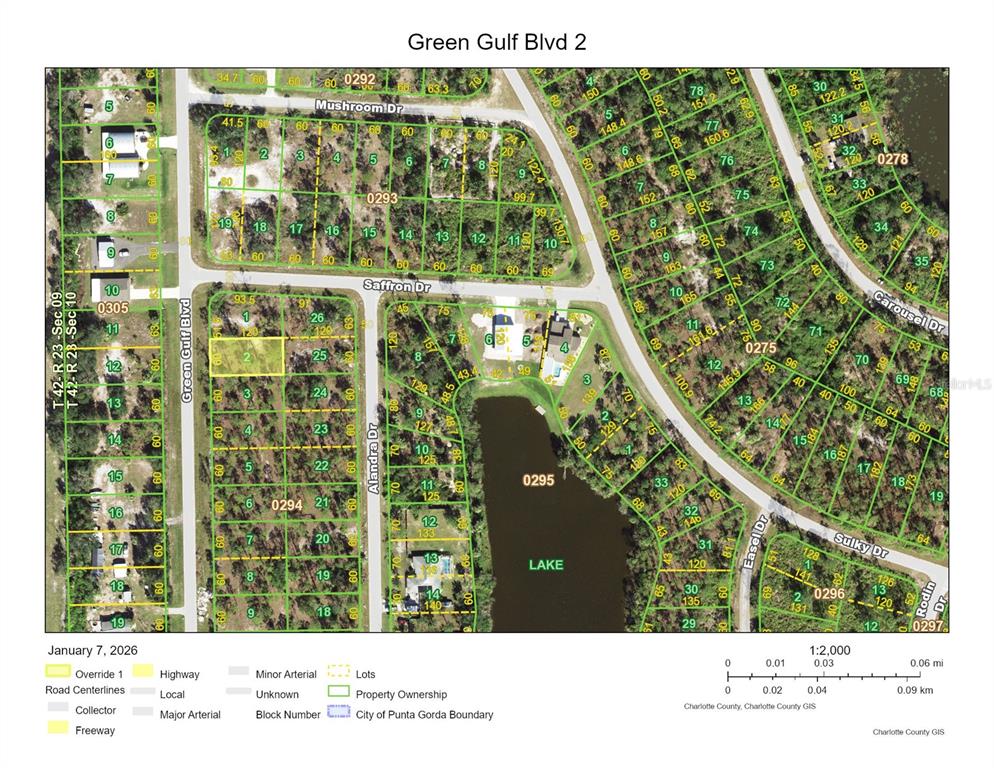 This is a map showing property lots, street layouts, and a lake in a residential area — 13302 GREEN GULF BLVD, PUNTA GORDA, FL