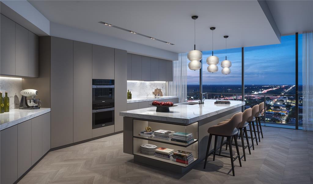 This is a rendering of a modern kitchen with a marble island and city skyline views — 1101 E JACKSON STREET UNIT 3602, TAMPA, FL