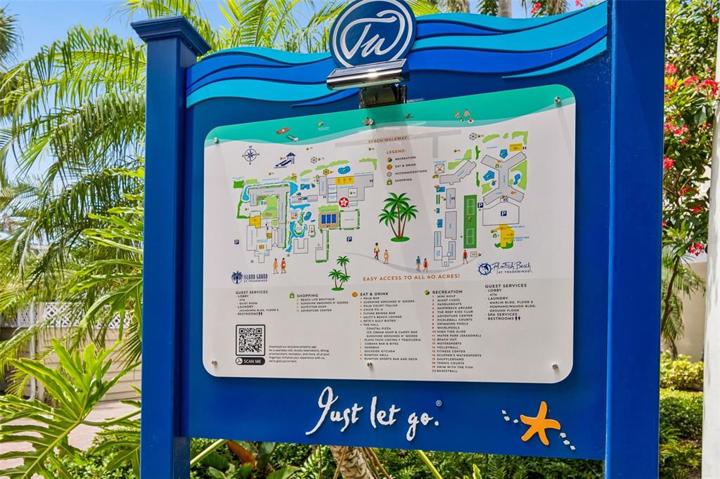 This is a map of the Tradewinds Island Grand resort grounds on a blue sign — 5500 GULF BOULEVARD UNIT 6241, ST PETE BEACH, FL