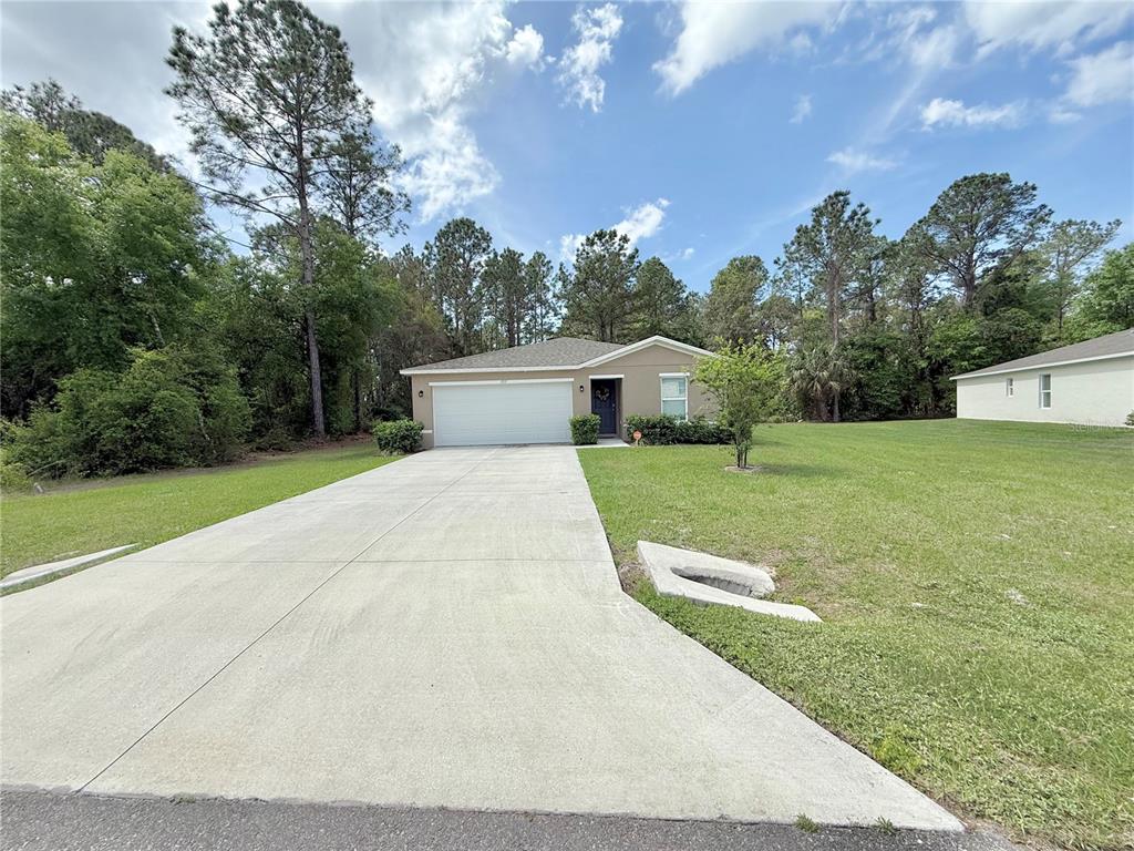 597 LIVE OAK LOOP, CRESCENT CITY, FL — photo 2 of 17