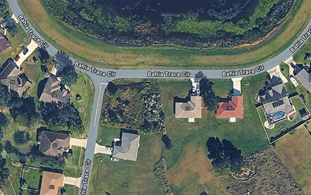 This aerial map shows a residential street with houses, driveways, and a nearby pond — 0000 BAHIA TRACE CIRCLE, OCALA, FL