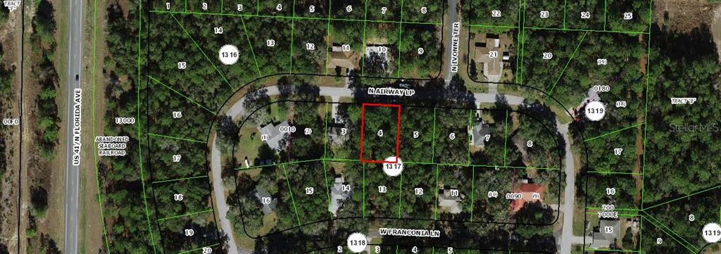 This is an aerial map showing a vacant residential lot highlighted in red — 10927 N AIRWAY LOOP, CITRUS SPRINGS, FL