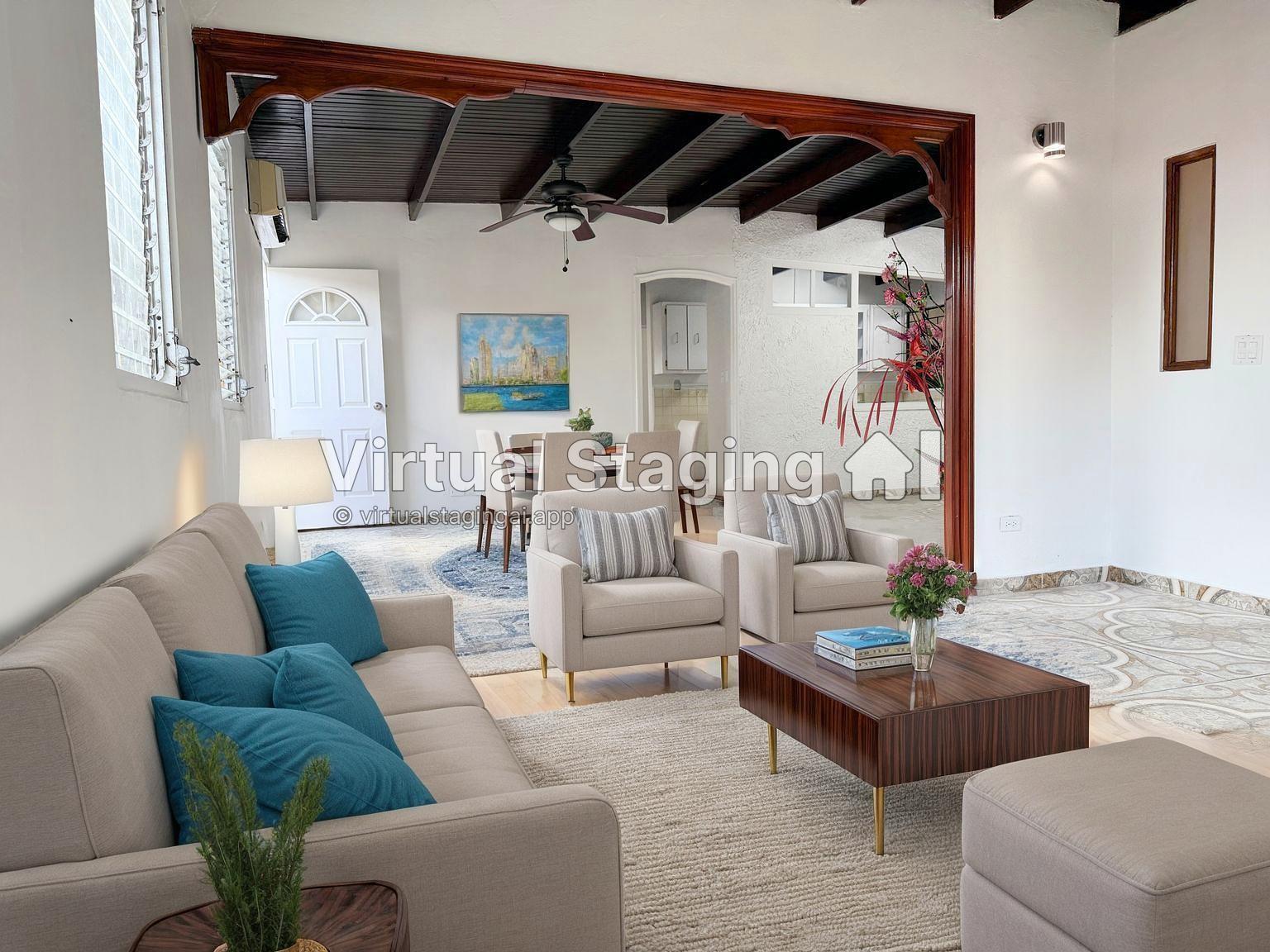 This is a virtually staged living room featuring a wooden archway and exposed ceiling beams — Panama City, Panama N Panama City, PA, PA