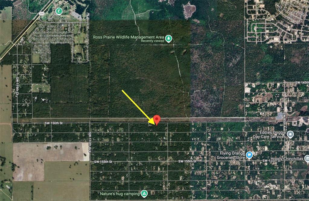 This is a satellite map view showing a property location marked with a red pin — Track 28 SW 150TH STREET, DUNNELLON, FL