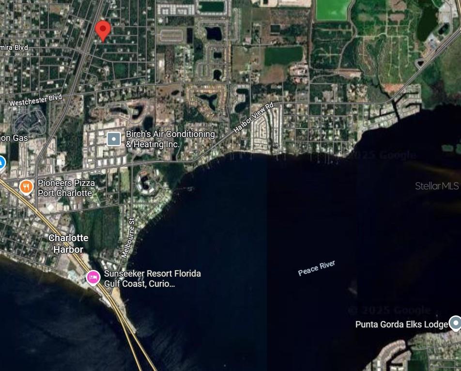 This is a satellite map view of the Charlotte Harbor area in Port Charlotte, Florida — 23350 BUCKNER AVENUE, PUNTA GORDA, FL