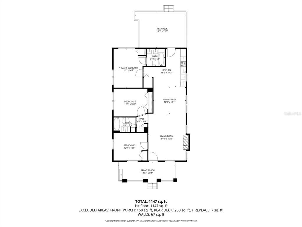 This is a floor plan of a house with three bedrooms, two bathrooms, and a deck — 3810 N ARLINGTON AVENUE, TAMPA, FL