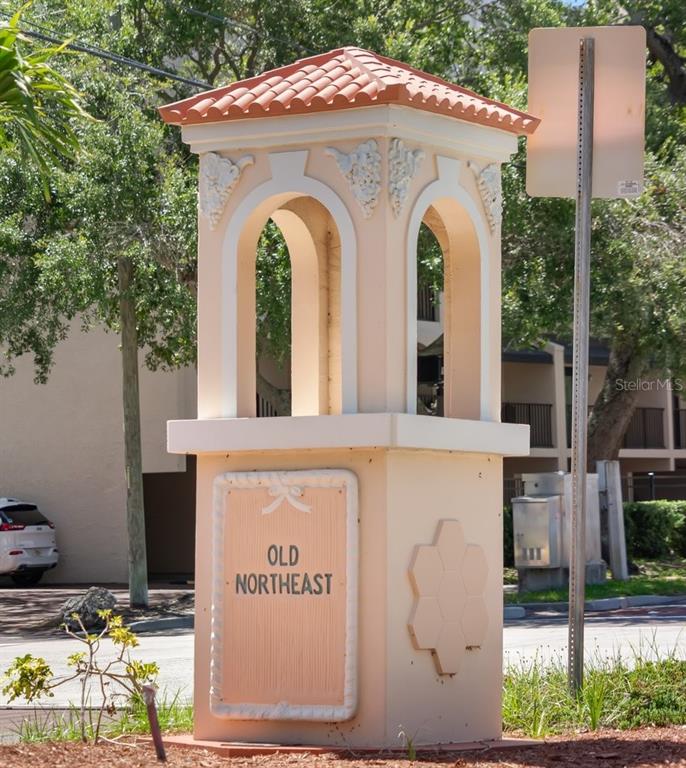 A decorative peach-colored monument sign with an arched top marks the Old Northeast neighborhood — 2120 1ST STREET N, ST PETERSBURG, FL