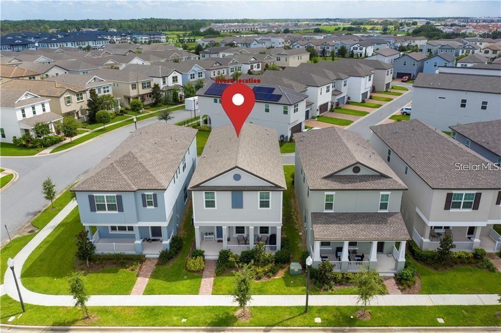 An aerial view shows a row of suburban houses with a red location pin — 14704 SETON CREEK BOULEVARD, WINTER GARDEN, FL