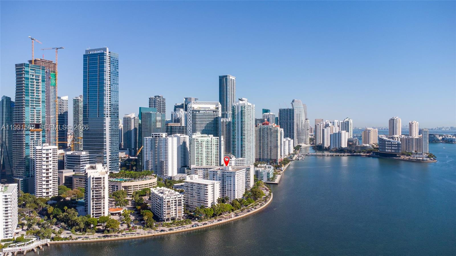 An aerial view of the Miami skyline featuring high-rise buildings along the waterfront — 1420 Brickell Bay Dr # 1003A, Miami FL 33131, MIAMI, FL