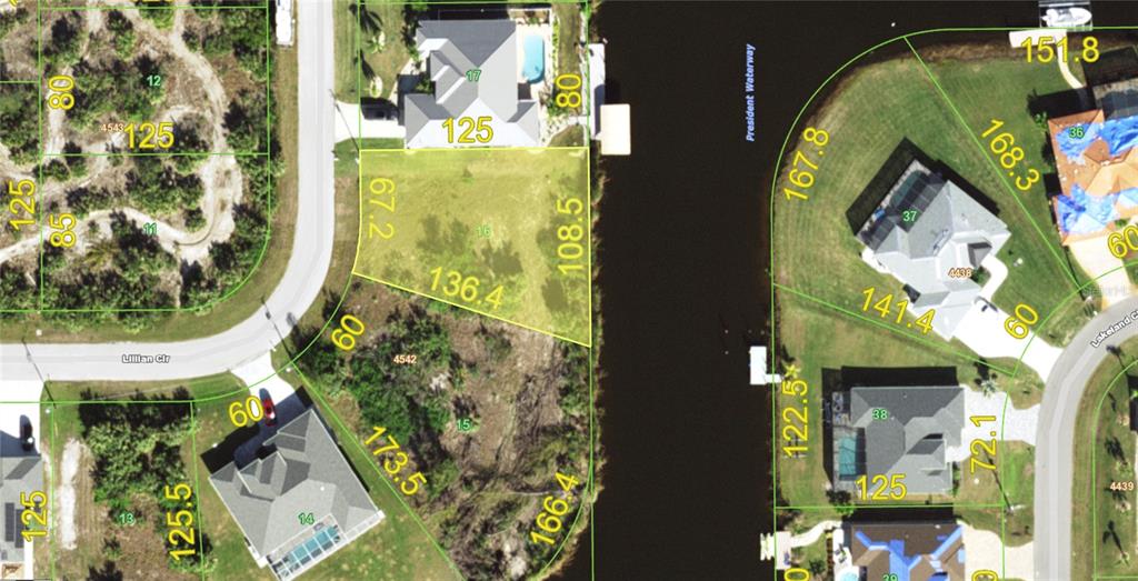This is an aerial map showing residential lots along a waterway — 14702 LILLIAN CIRCLE, PORT CHARLOTTE, FL