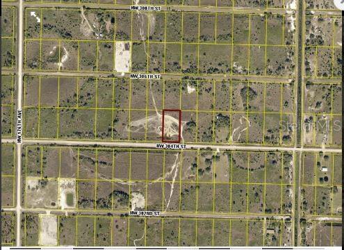 This aerial map shows a rectangular plot of land highlighted in red along a road — 17167 NW 304TH STREET, OKEECHOBEE, FL