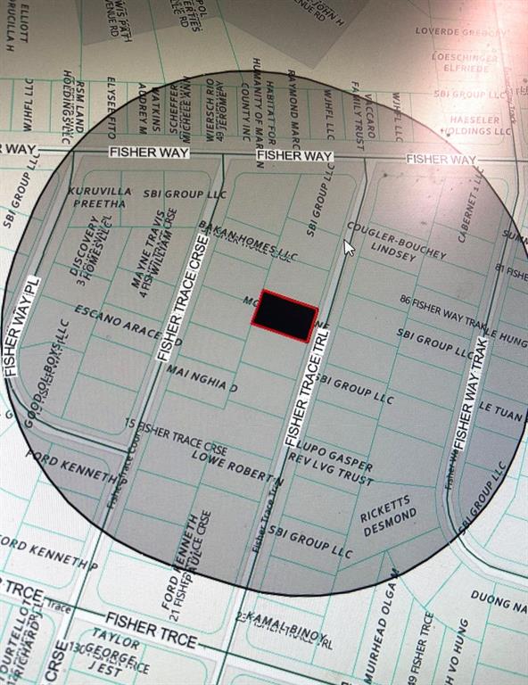 This is a map showing a highlighted property parcel within a circular search radius — 0 FISHER TRACE TRAIL E, OCKLAWAHA, FL