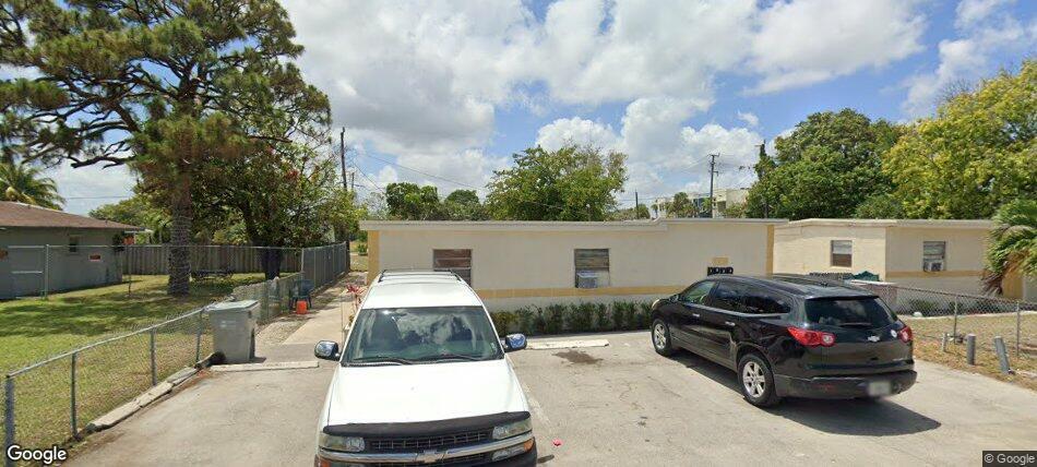 A white SUV and a black minivan are parked in front of a single-story building — 831 NW 17th Terrace # 4, Pompano Beach FL 33069, POMPANO BEACH, FL