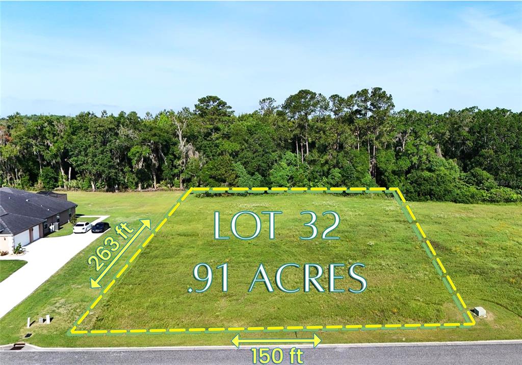 An aerial view shows a vacant, grassy residential lot marked with dimensions and property boundaries — XX NW 79TH LOOP, OCALA, FL