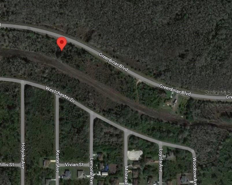 This is a satellite map view showing a red location pin near Greenbriar Boulevard — 483 GREENBRIAR BOULEVARD, LEHIGH ACRES, FL