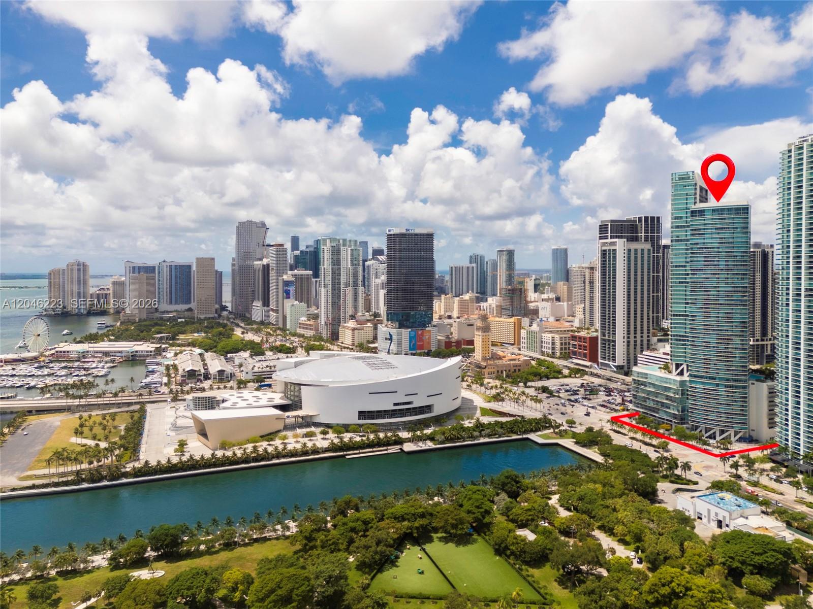 An aerial view of the Miami skyline featuring the Kaseya Center and a marked skyscraper — 888 Biscayne Blvd # 2002, Miami FL 33132, MIAMI, FL