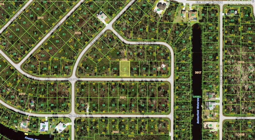 This is a map showing a highlighted vacant lot in a residential subdivision — 12462 BENNER LANE, PORT CHARLOTTE, FL