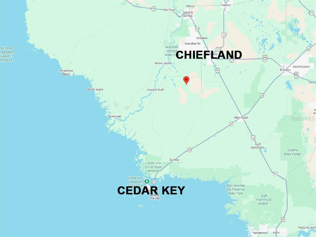 This is a map showing the location of a property between Chiefland and Cedar Key — Lots 4 & 5 NW 56TH STREET, CHIEFLAND, FL
