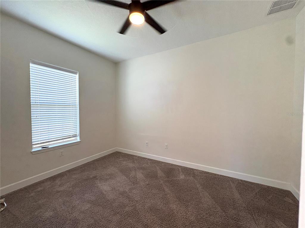 4645 BUTLER NATIONAL DRIVE, WESLEY CHAPEL, FL — photo 4 of 29