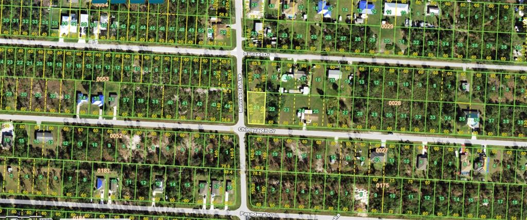 This is an aerial map showing residential property lots and street layouts in a neighborhood — 27396 CHINQUAPIN DRIVE, PUNTA GORDA, FL