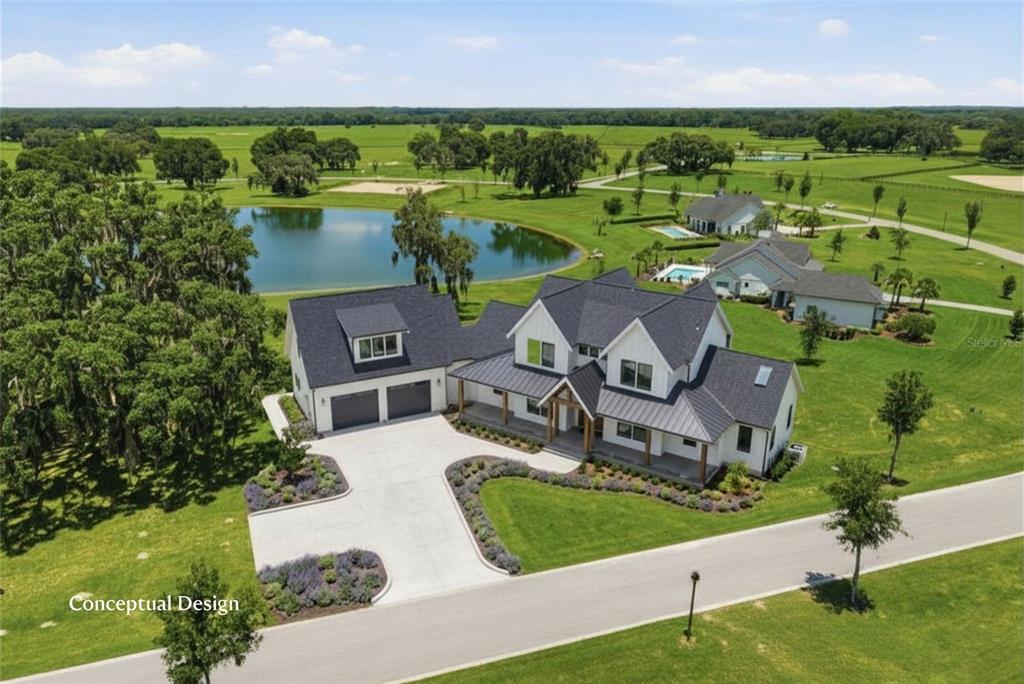 This is a rendering of a modern farmhouse with a dark roof and attached garage — TBD (Lot 22-W) SW 138TH LOOP, DUNNELLON, FL