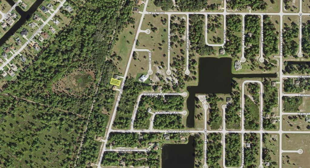 This is an aerial map view of a residential lot highlighted in yellow — 193 BRIG CIRCLE W, PLACIDA, FL