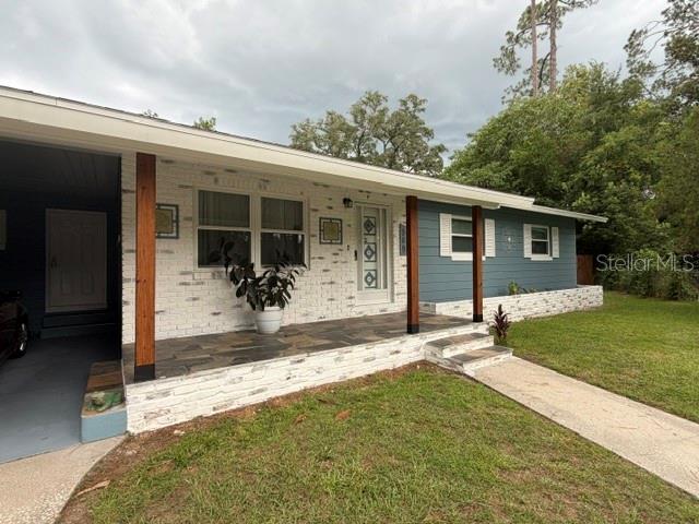 569 NE 21ST TERRACE, OCALA, FL — photo 2 of 25