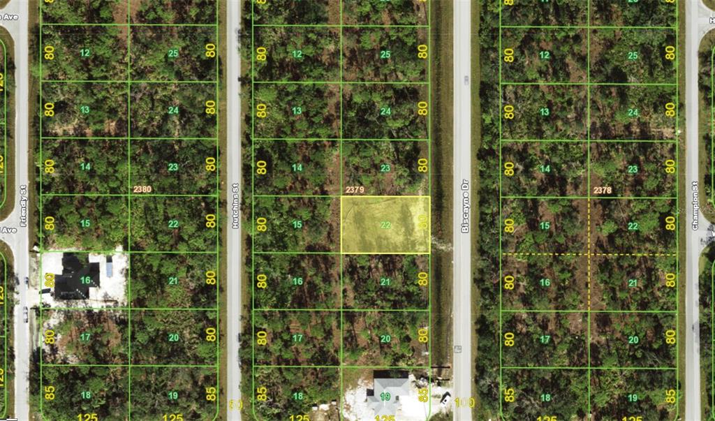 This is a satellite map view showing a highlighted rectangular land parcel among wooded lots — 493 BISCAYNE DRIVE, PORT CHARLOTTE, FL