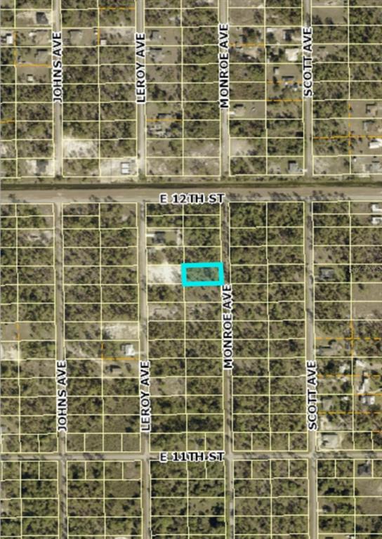 An aerial map view highlights a rectangular plot of land located along Monroe Avenue — 1119 MONROE AVENUE, LEHIGH ACRES, FL
