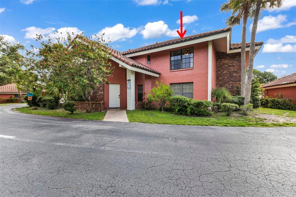 A two-story building with a red stucco exterior and a tile roof — 3013 CLARK ROAD UNIT 6, SARASOTA, FL