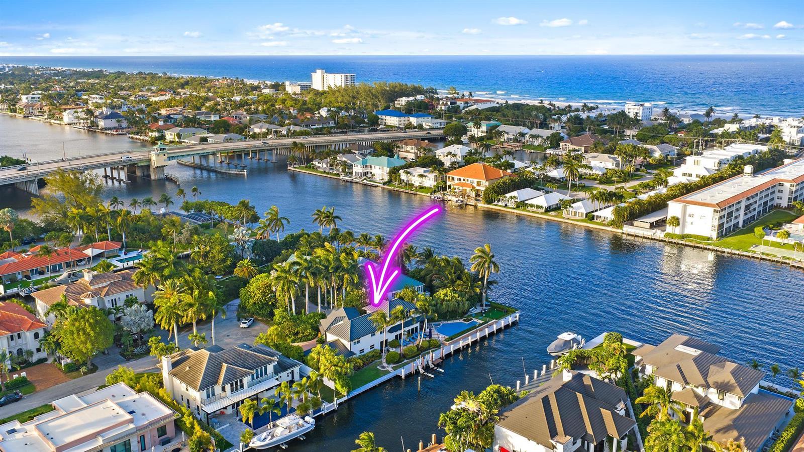 An aerial view shows a waterfront house with a pool and boat dock — 964 Eve Street, Delray Beach FL 33483, DELRAY BEACH, FL
