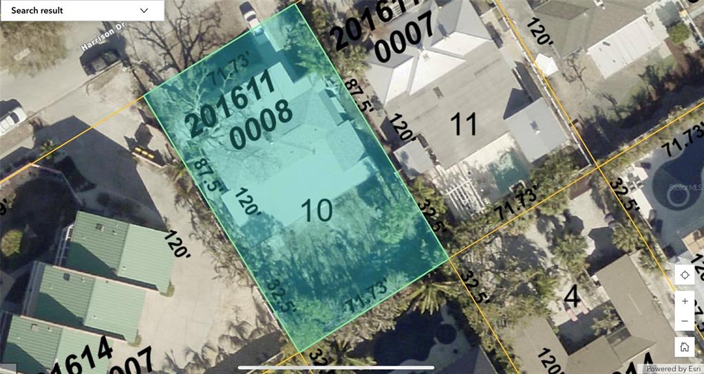 This is an aerial map view showing property lot lines and dimensions for a residential area — 132 HARRISON DRIVE, SARASOTA, FL