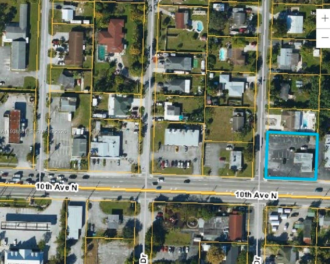An aerial map view shows a commercial property outlined in blue along a busy road — 3801 N 10th Ave N, Palm Springs FL 33461, PALM SPRINGS, FL
