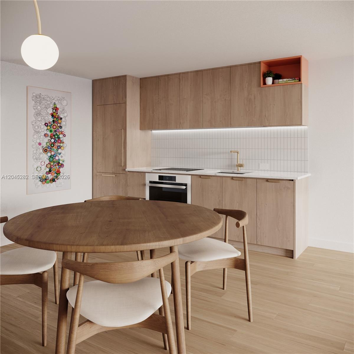 This is a rendering of a modern kitchen and dining area with light wood cabinetry — 90 NE st 32nd st # 906, Miami FL 33127, MIAMI, FL