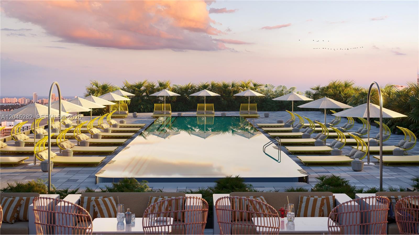 This is a rendering of a rooftop swimming pool area with lounge chairs and umbrellas — 90 NE st 32nd st # 906, Miami FL 33127, MIAMI, FL