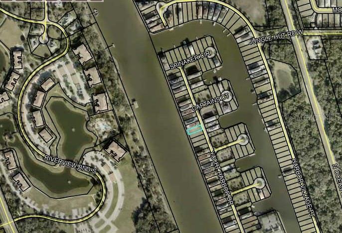 This is an aerial map showing a residential canal-front neighborhood with a highlighted property lot — 282 YACHT HARBOR DRIVE, PALM COAST, FL