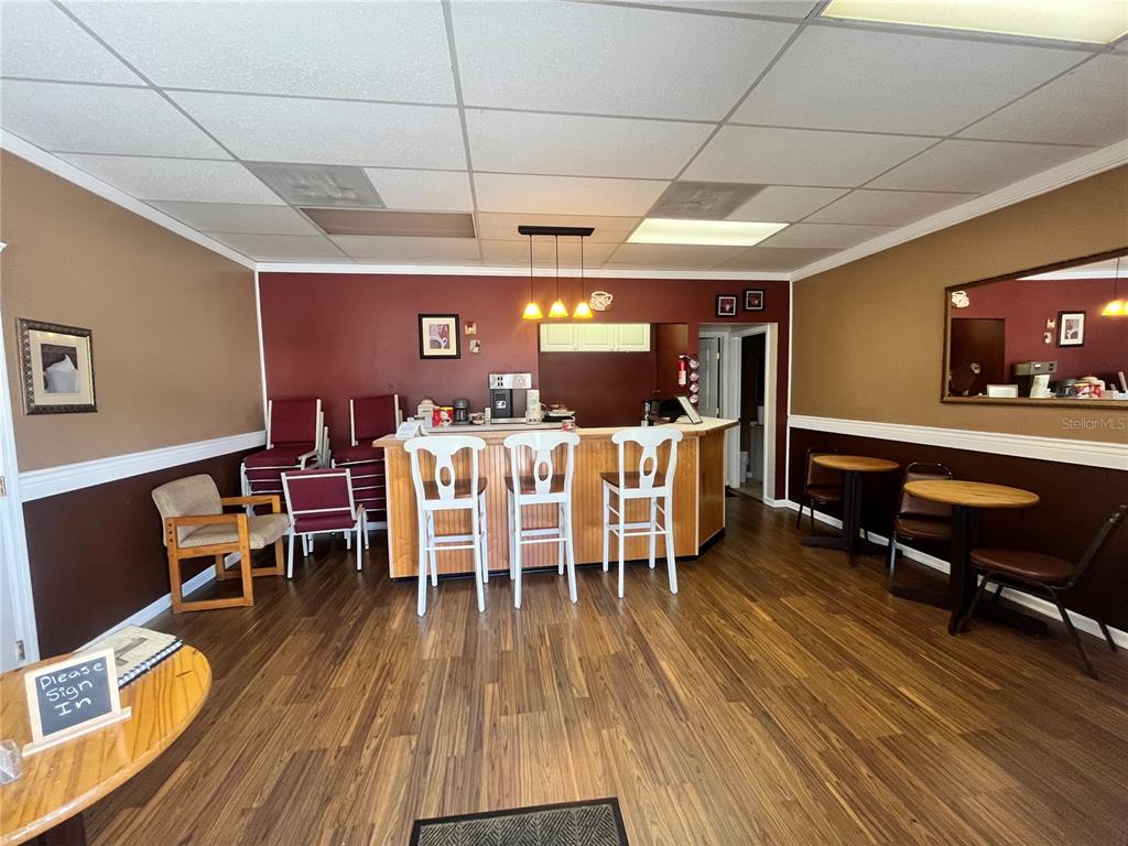 This is a floor plan showing a lobby, sanctuary, office, bathroom, utility room, and rear area — 1165 1ST STREET S UNIT 1165, WINTER HAVEN, FL