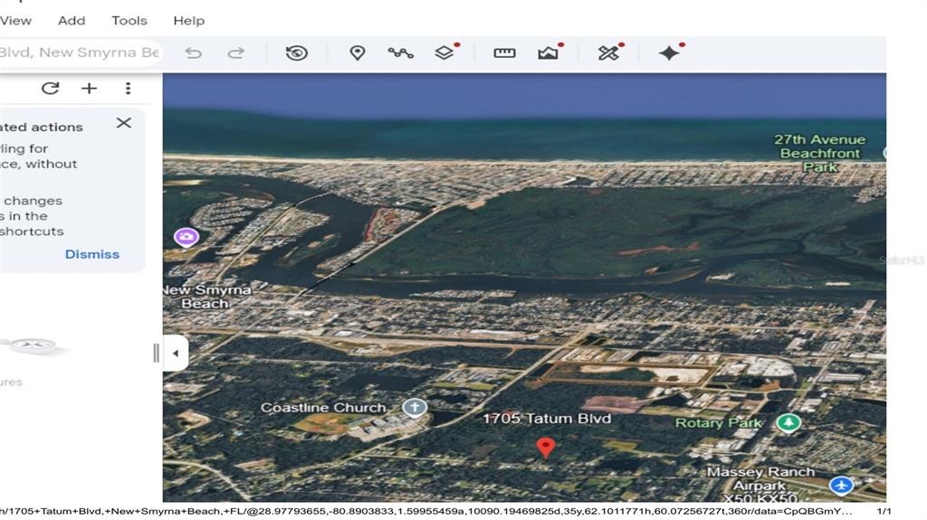 This is a satellite map view showing a residential area near New Smyrna Beach — 1705 TATUM BOULEVARD, NEW SMYRNA BEACH, FL