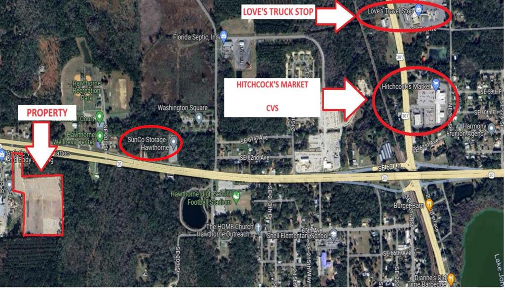 This aerial map shows a vacant property lot highlighted in red near local businesses — 20065 SE HAWTHORNE ROAD, HAWTHORNE, FL