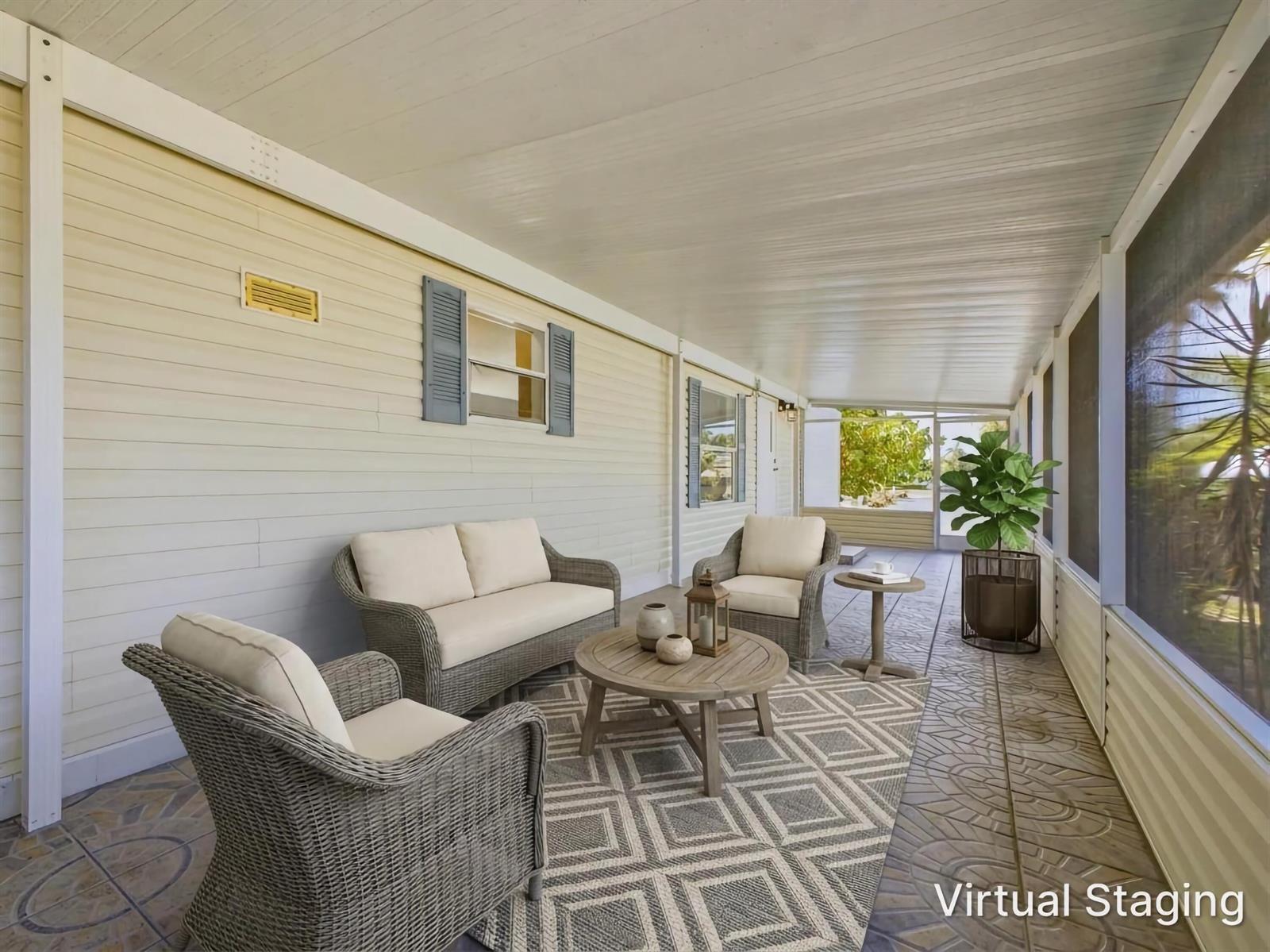 This is a virtually staged, covered outdoor patio with wicker furniture and a patterned rug — 4185 N Shady Lane, Boynton Beach FL 33436, BOYNTON BEACH, FL