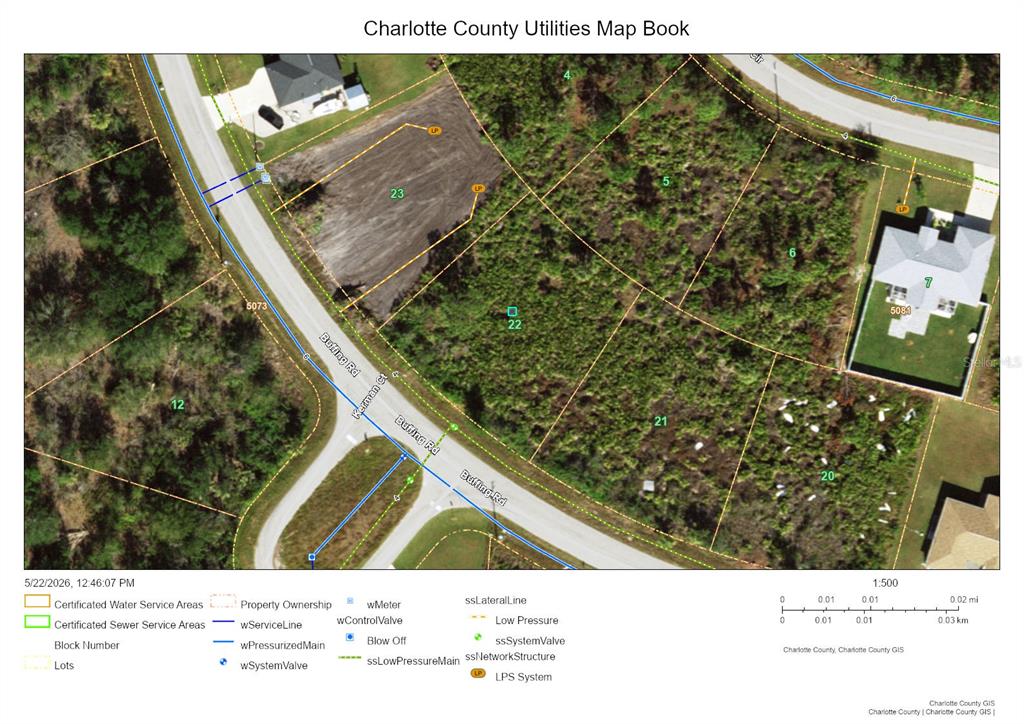 This is a utility map showing property lots, road names, and infrastructure lines in Charlotte County — 12400 BUFFING ROAD, PORT CHARLOTTE, FL