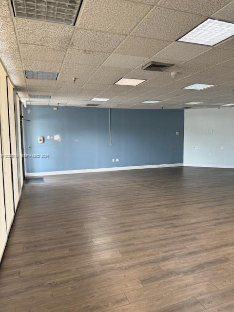 The exterior entrance of a commercial building features a glass door labeled with suite numbers — 9080 Kimberly Blvd # 4, Boca Raton FL 33434, BOCA RATON, FL
